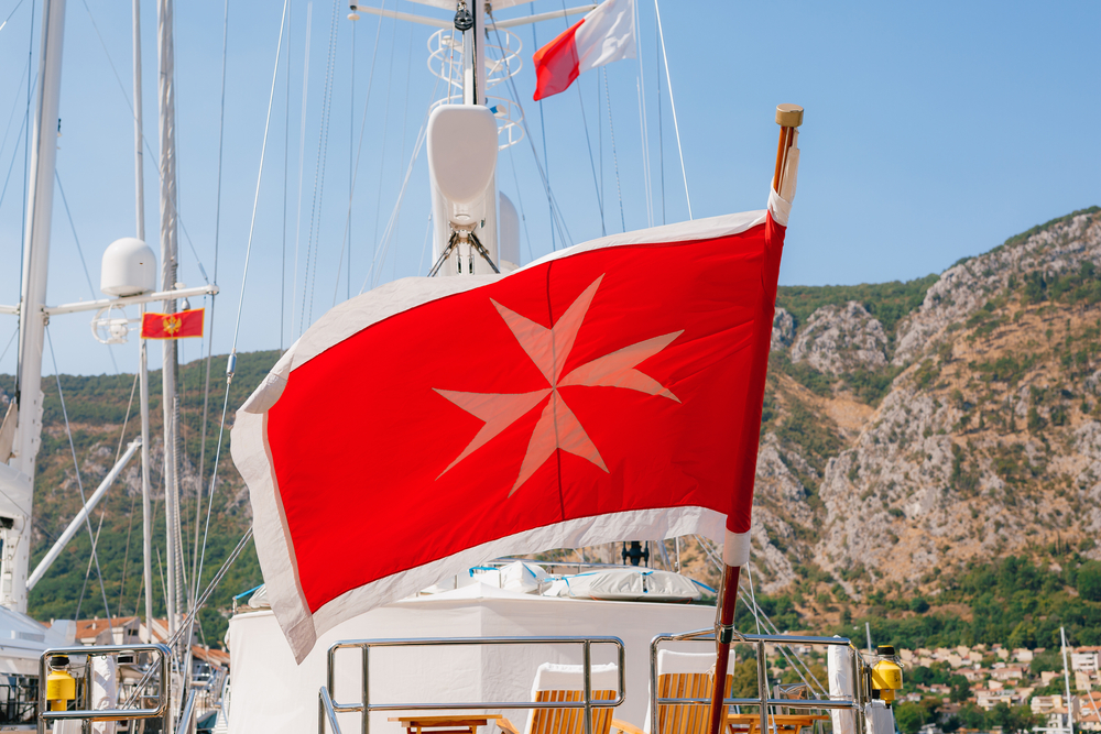 Maltese Flag flying on a yacht